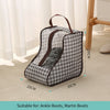 A checkered fabric boot storage bag with a handle is shown on a light carpet.