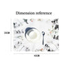 Dimension reference showing a white teacup and spoon on a white fabric with floral accents.