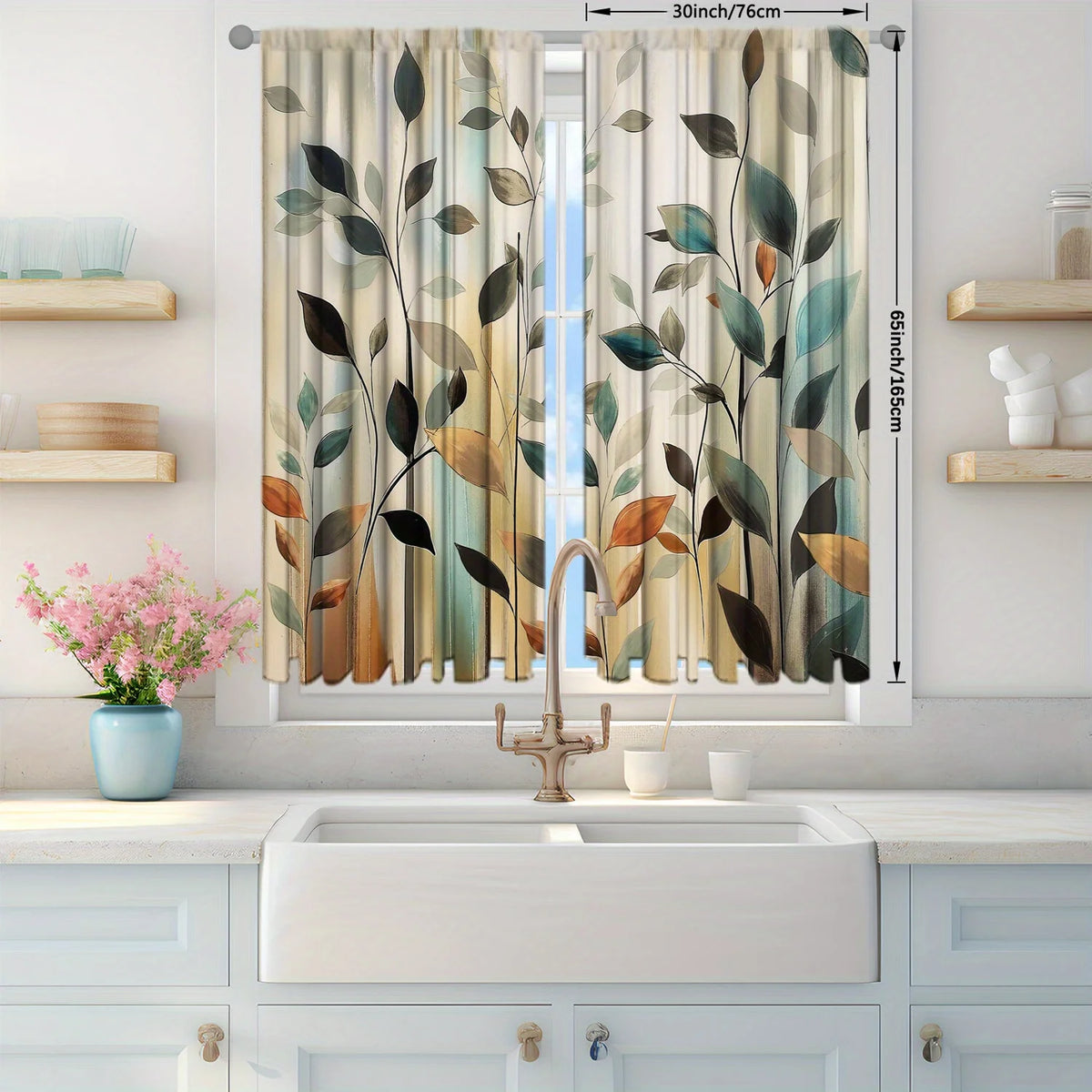 A set of two sheer curtains with an abstract leaf print in muted greens and browns hanging in a window.