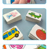 A hand holds a stack of colorful puzzle cards featuring animals and fruits for a Montessori matching game.