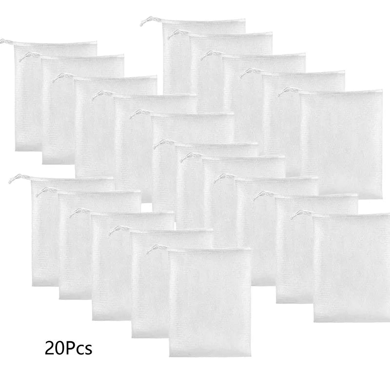 A collection of twenty white exfoliating foaming soap net bags hanging by their loops.