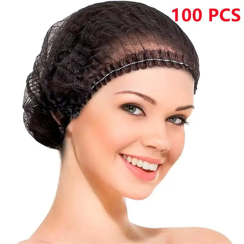 A woman is modeling a black disposable bouffant hair cap, showing the netting and elastic band.