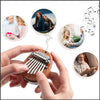 Hands hold a wooden kalimba thumb piano while musical notes float around.