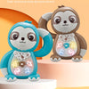A sloth plush toy with light-up features is displayed on a tiered stand.
