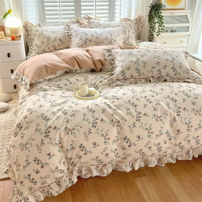 A floral ruffle cotton duvet cover set featuring a light beige background with small blue and green floral patterns.