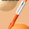 A close-up of an orange and white prank water gun pen with a fine grinding tip, demonstrating smooth writing and burr-free pe