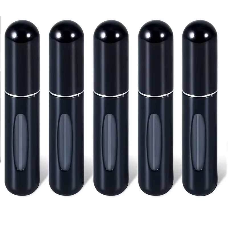 A set of five sleek, black, cylindrical perfume spray bottles standing upright.