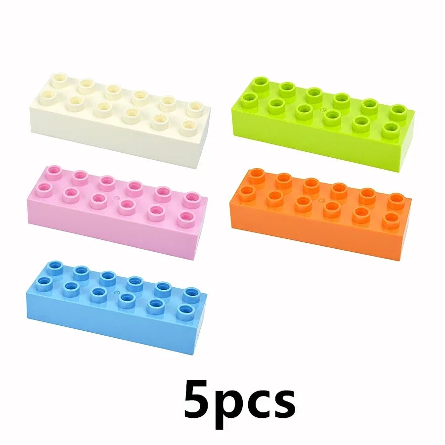 Five sets of large building blocks in white, green, pink, orange, and blue colors.