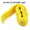 Yellow trailer rope coiled and laid out for vehicle recovery towing.