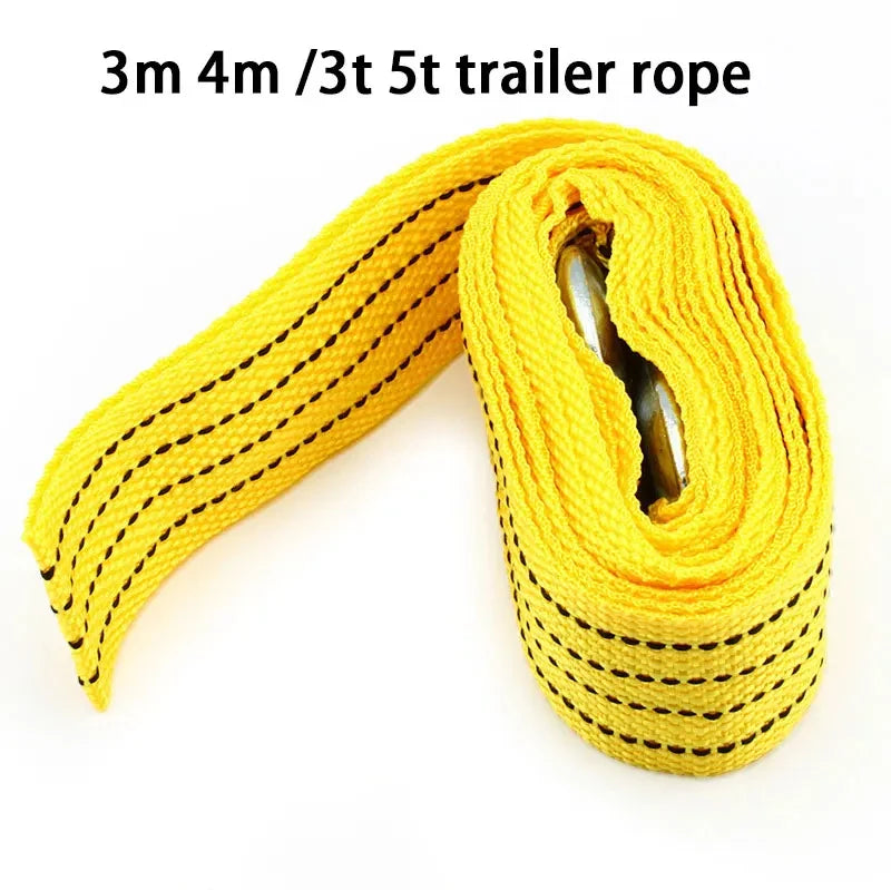 Yellow trailer rope coiled and laid out for vehicle recovery towing.