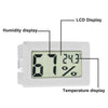 A white digital thermometer and hygrometer displaying humidity at 67% and temperature at 24.3 degrees.