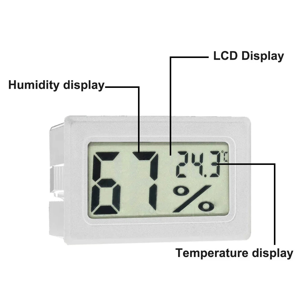 A white digital thermometer and hygrometer displaying humidity at 67% and temperature at 24.3 degrees.
