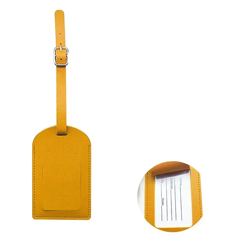 A yellow PU leather luggage tag with a silver clasp and a rectangular shape.