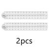Two transparent plastic rulers for measuring and drawing tools.