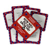 A stack of red and white cards featuring questions for family and friends used in a truth or dare game