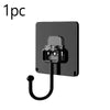 A black adhesive hook with a curved metal loop attached, used for kitchen or bathroom storage.