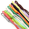 A variety of colorful braided nylon lanyards in shades of yellow, green, orange, purple, and black are displayed.