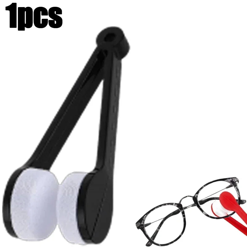 A black microfiber cleaning tool for glasses is shown next to a pair of eyeglasses.
