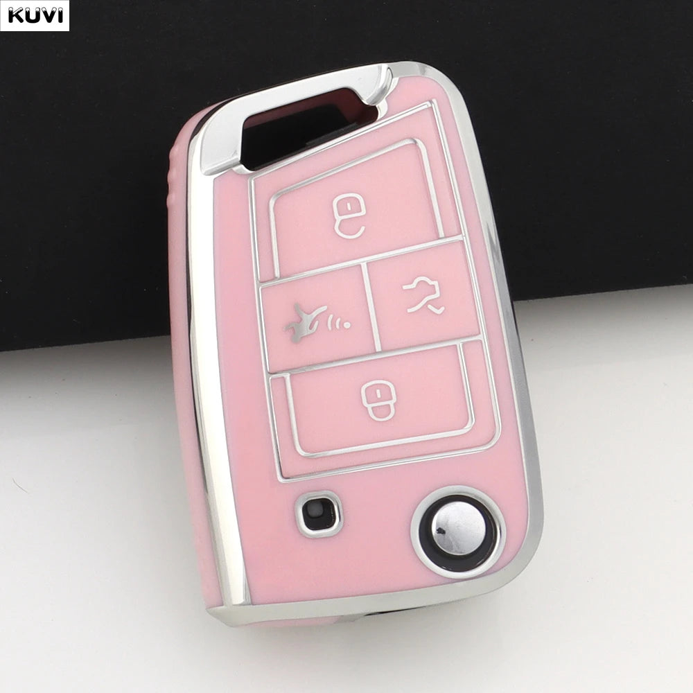 A pink TPU car key cover for VW, SEAT & Skoda models showing various key cutouts and a camera lens.