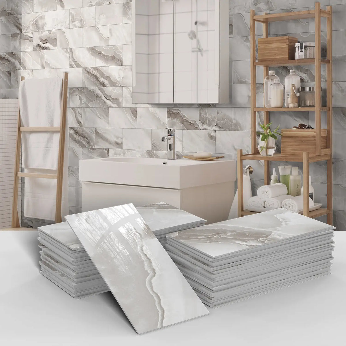 Stacks of white marble self-adhesive tiles displayed against a bathroom wall with a sink and wooden shelving.