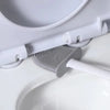 A white wall-mounted toilet brush set with a silicone head is shown above a white ceramic toilet bowl.