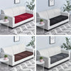A white sofa slipcover with dark gray and maroon cushions displayed in various patterns.