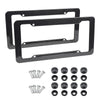 A set of black carbon fiber style license plate frames, including front and rear versions, with mounting screws.
