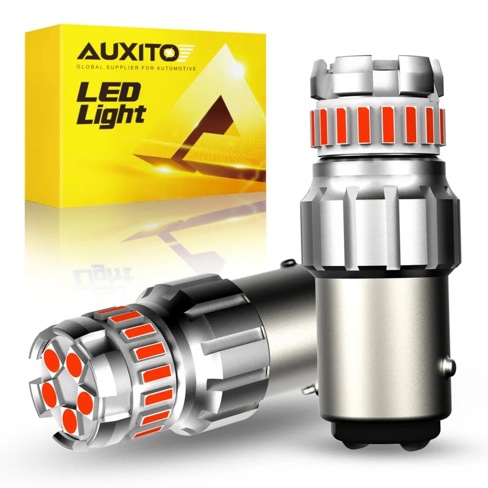 A pair of bright LED lights for automotive use shown next to its packaging box.