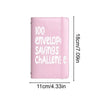 A pink binder for a 100-day envelope savings challenge with text on the cover.