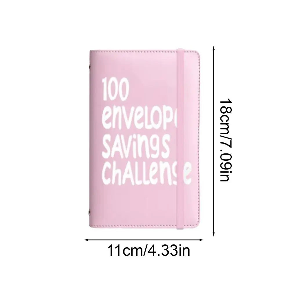 A pink binder for a 100-day envelope savings challenge with text on the cover.