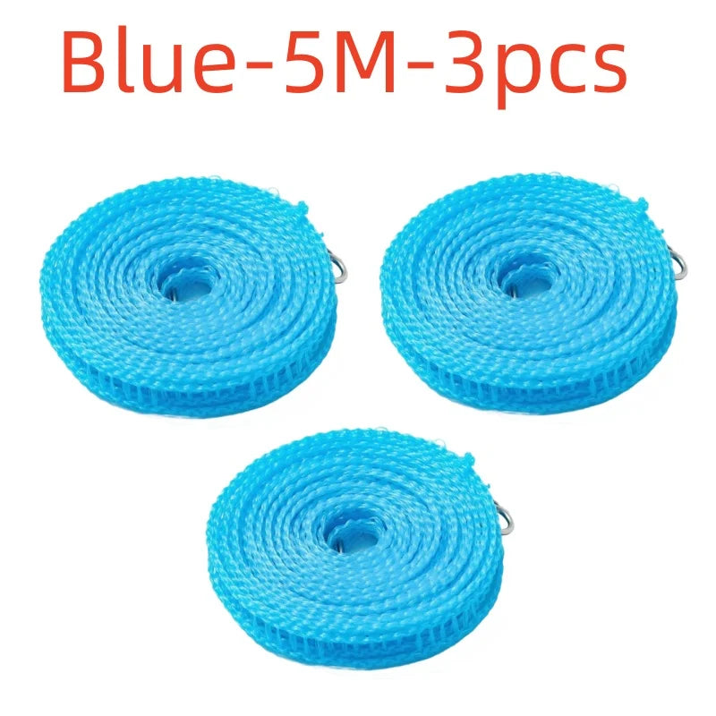 Three blue heavy-duty nylon outdoor clotheslines rolled up for drying laundry