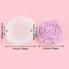 A light pink silicone mold shaped like a rose peony flower, used for crafting.