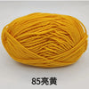 A ball of bright yellow 85-count cotton yarn for knitting and crochet.