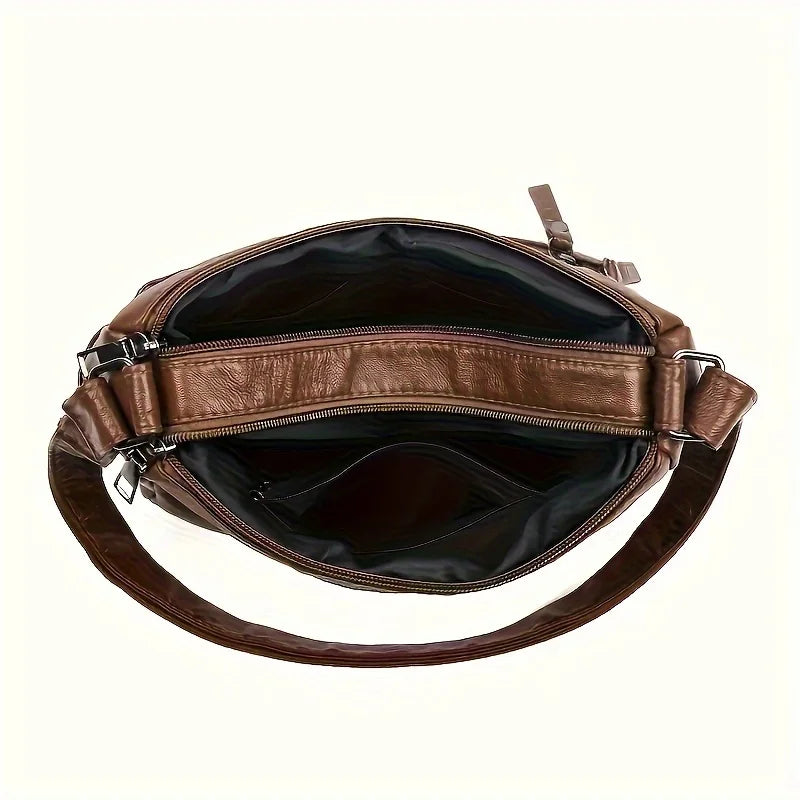A brown vintage PU leather crossbody bag with a flap and leather strap.