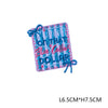 Pink and blue embroidered letter patch with a bow featuring the text Blue Collar Dollar