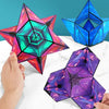 Three magnetic fidget cubes in pink, blue, and purple form geometric 3D puzzles on a white surface.