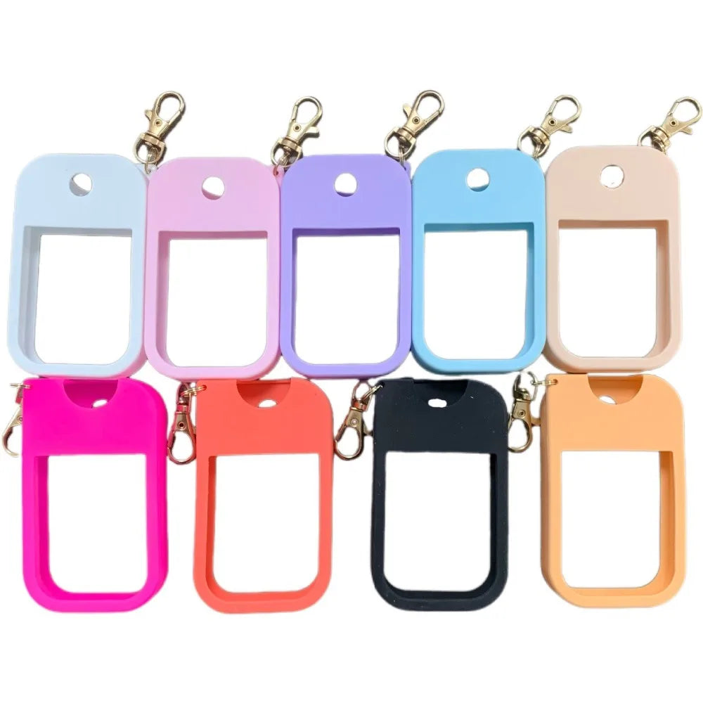 A set of silicone protective cases for hand sanitizer spray with metal keyrings in various pastel colors.