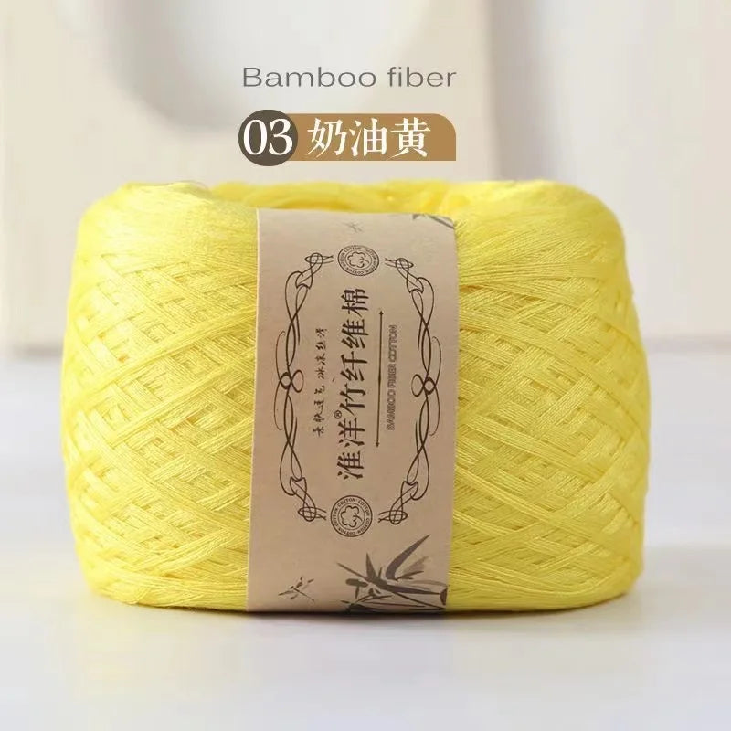 Yellow bamboo fiber yarn skein labeled as 03 奶油黃 (Cream Yellow)