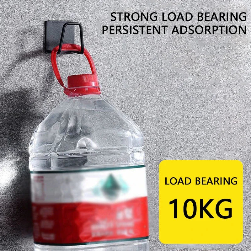 A clear plastic bottle with a red label is shown hanging from a black wall mount, demonstrating strong load bearing adsorptio