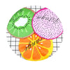Three fruit-themed waterproof shower caps featuring kiwi, watermelon, and orange designs.