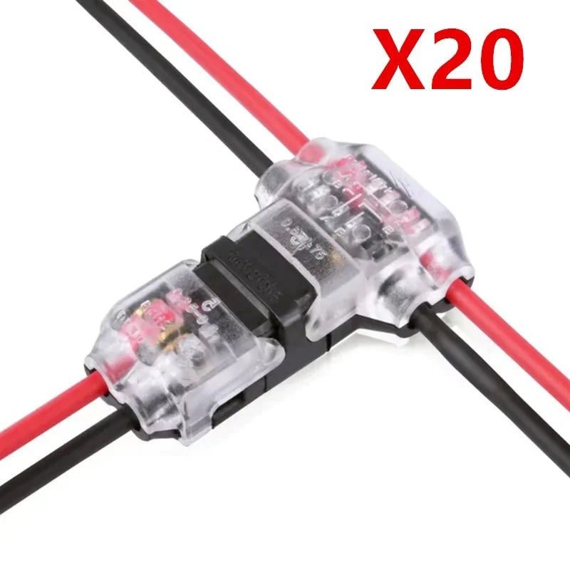 A close-up view of twenty red and black quick solderless T-tap wire connectors.