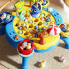 A colorful magnetic fishing game toy with yellow and blue components and various plastic fish figures.