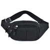 Black canvas waist pack or fanny pack with multiple pockets shown from the front