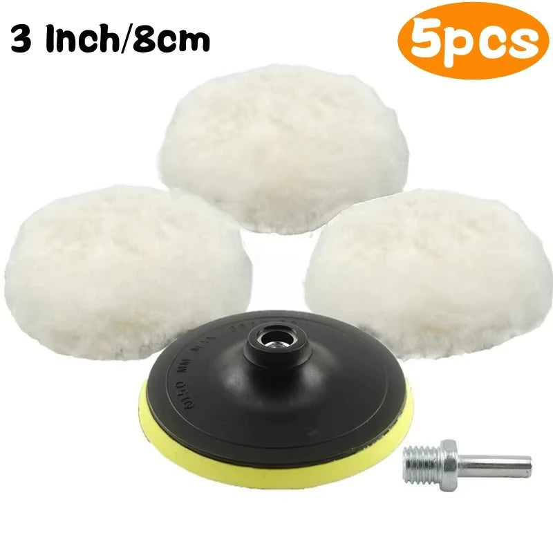A set of five white wool car polishing pads with a black backing pad and a drill adapter.