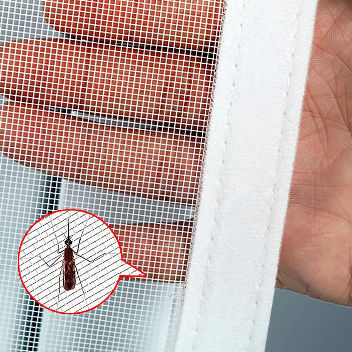 Close-up of a self-adhesive window screen mesh with a mosquito visible through the netting.