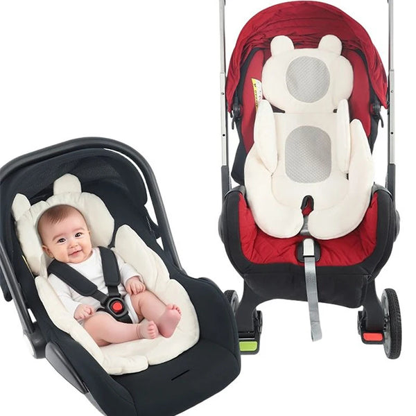 A red and black stroller seat cushion with a white bear-shaped insert is shown on a stroller frame.