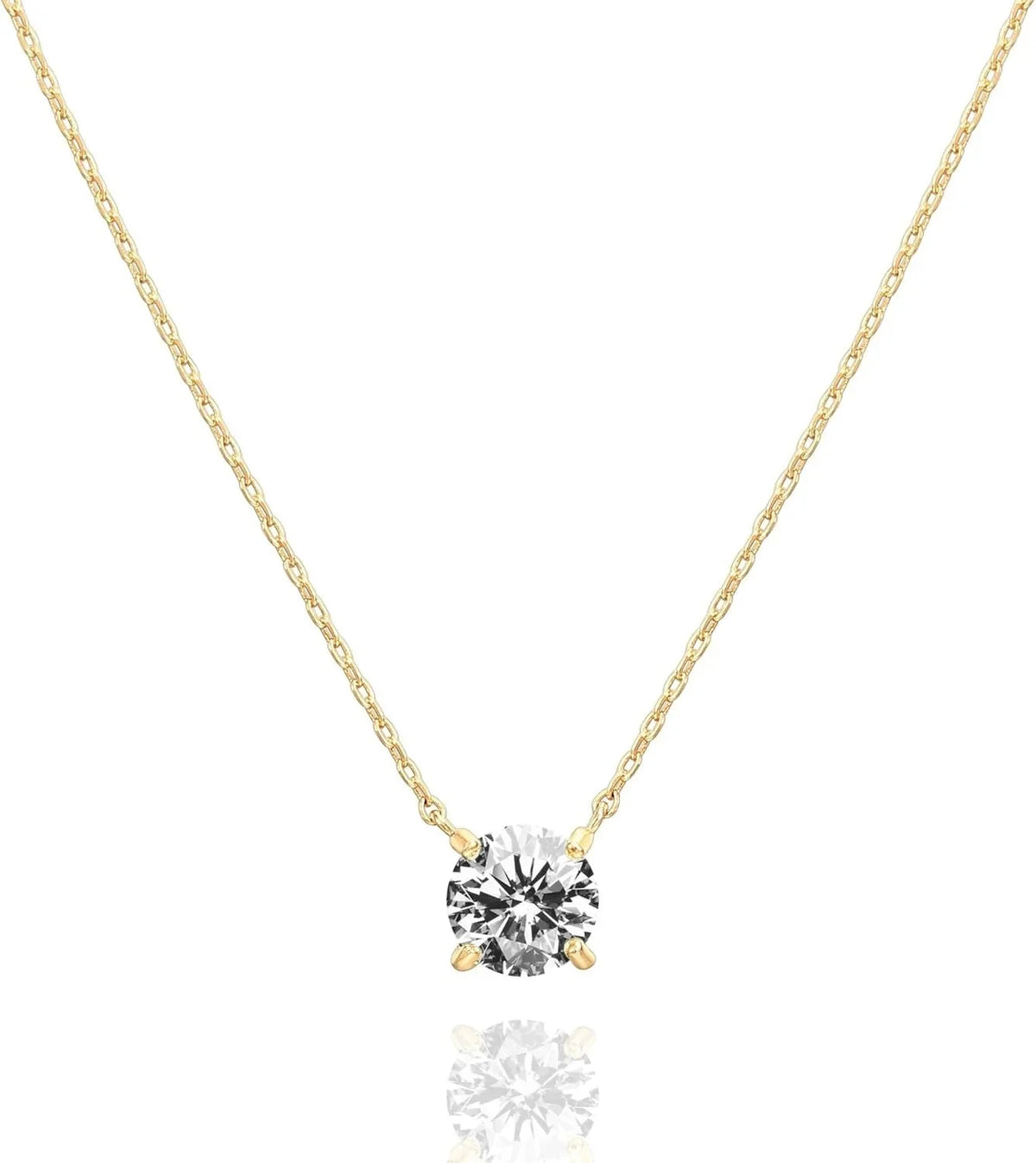 A dainty crystal solitaire necklace featuring a clear round gemstone set in a delicate gold chain.