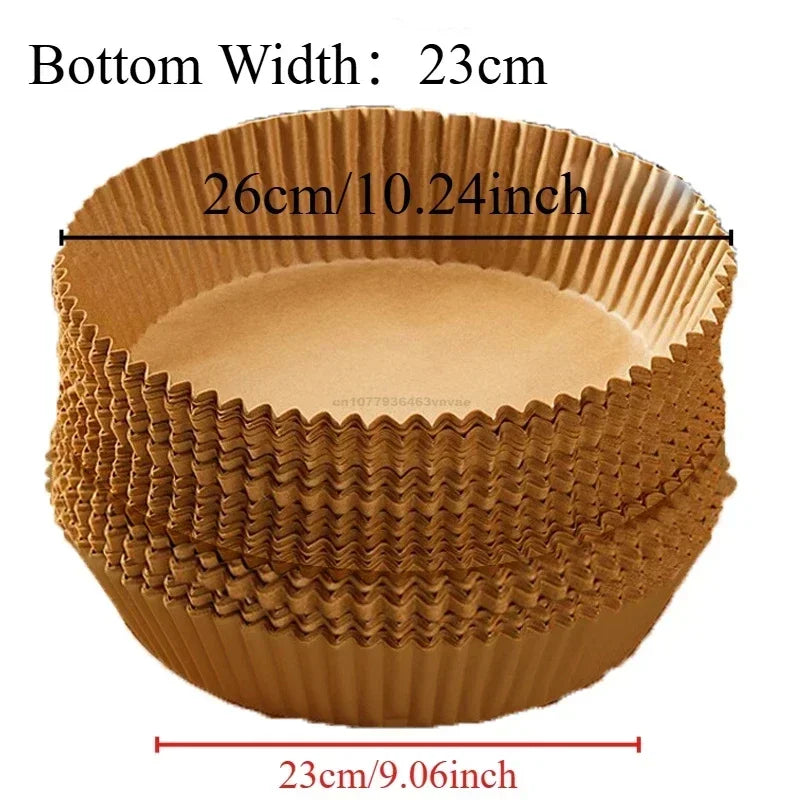 A round, brown disposable parchment paper liner for an air fryer, showing its dimensions.
