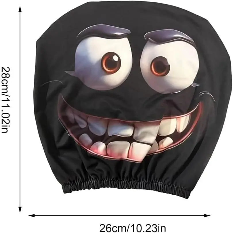 A black plush eye cartoon headrest cover featuring a wide, smiling face with large eyes.