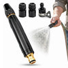 A black high pressure power washer nozzle and related accessories are shown being used to spray water.